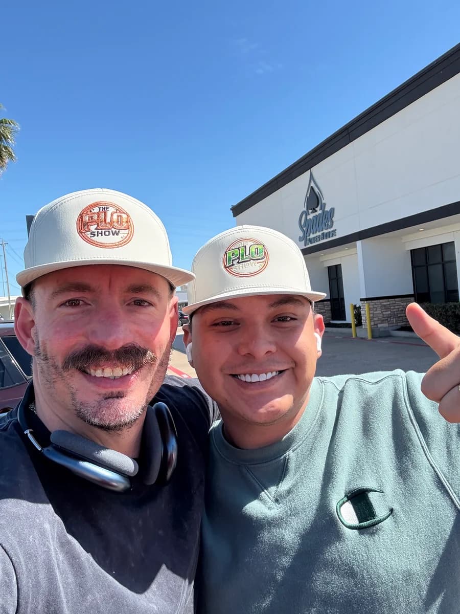 Two PLO Show fans wearing the brand hats