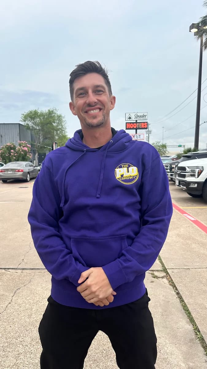 PLO Show fan wearing the purple hoodie