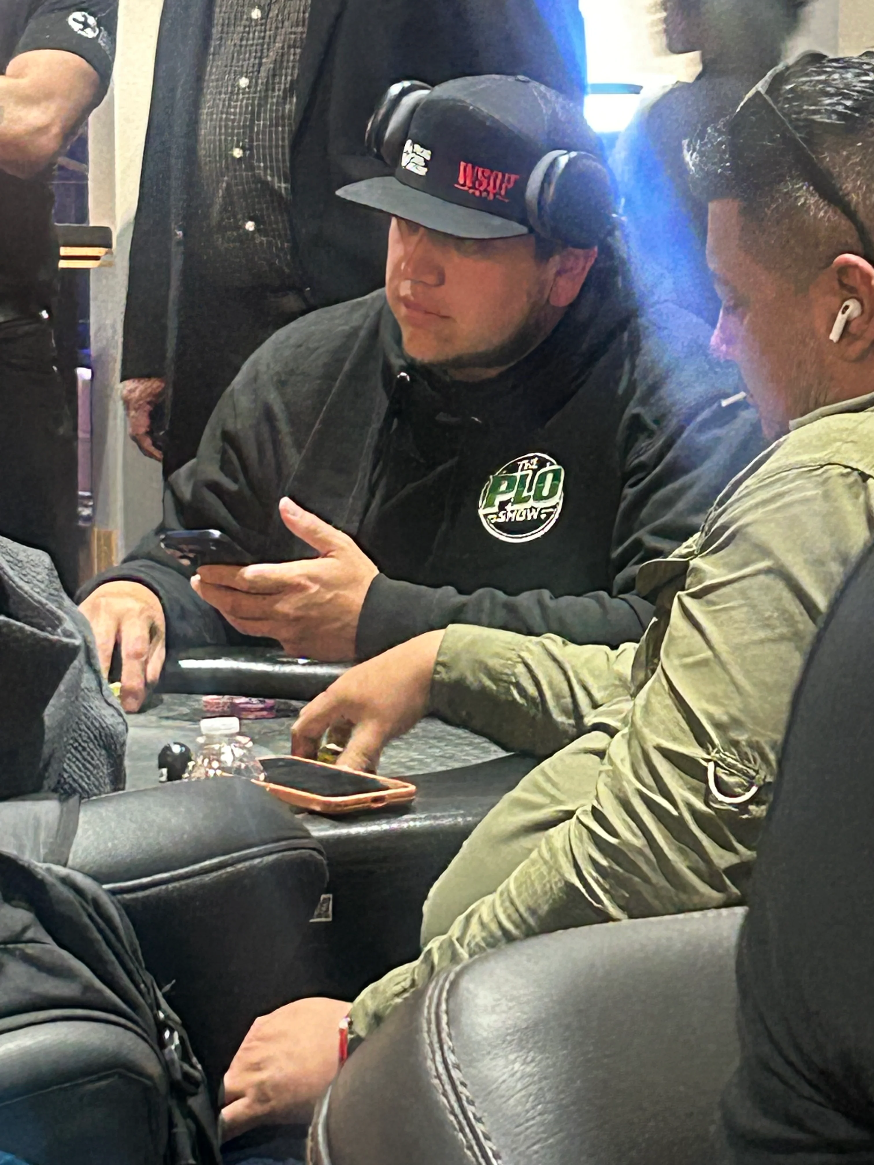 PLO Show fan in the black hoodie at a WSOP poker tournament